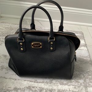 Black and gold michael kors purse